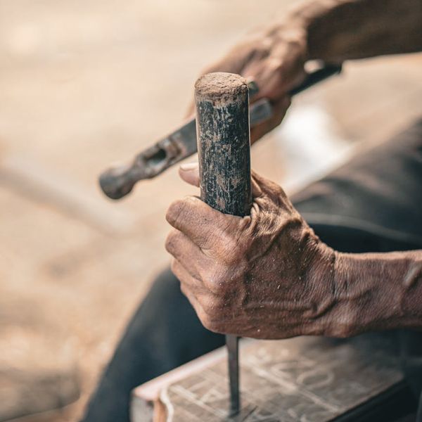 Focus on wooden tools used for relaxation techniques.